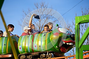 Adults and childrens ride on the Russian roller coaster