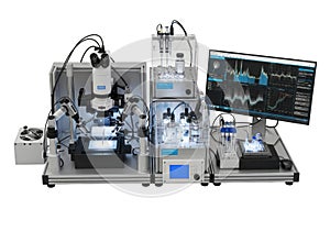 Advanced laboratory equipment setup with microscope and computer screen displaying data