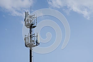 Advanced radio transmission tower with blue sky in the background