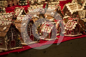 Advent Bazaar Stalls with glass, wooden, ceramic christmas souvenirs in shops. Close up of festive decorations for