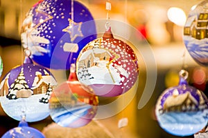 Advent Bazaar Stalls with glass, wooden, ceramic christmas souvenirs in shops. Close up of festive decorations for