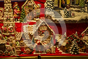 Advent Bazaar Stalls with glass, wooden, ceramic christmas souvenirs in shops. Close up of festive decorations for