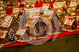 Advent Bazaar Stalls with glass, wooden, ceramic christmas souvenirs in shops. Close up of festive decorations for