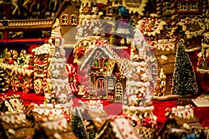 Advent Bazaar Stalls with glass, wooden, ceramic christmas souvenirs in shops. Close up of festive decorations for