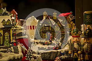 Advent Bazaar Stalls with glass, wooden, ceramic christmas souvenirs in shops. Close up of festive decorations for