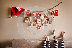 The advent calendar hanging on the wall. small gifts surprises for children