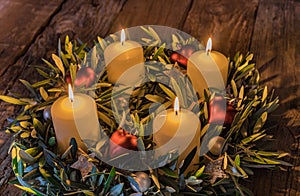 Advent Christmas wreath with four burning candles