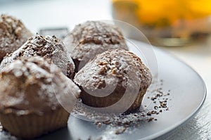 Tea party. Homemade muffins with pieces of chocolate.