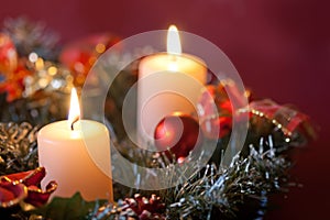 Advent wreath with burning candles.