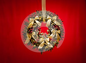 Advent wreath over red background