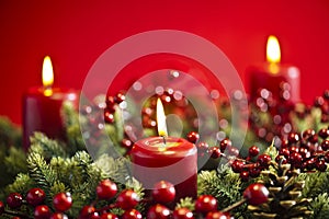 Advent wreath over red background