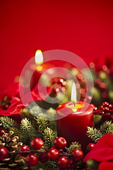 Advent wreath over red background