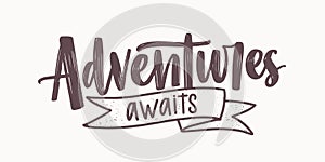 Adventure Awaits motivational message or phrase written with elegant cursive calligraphic font and decorated by ribbon photo