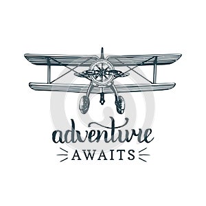 Adventure awaits motivational quote.Vintage retro airplane logo.Vector sketched aviation illustration in engraving style