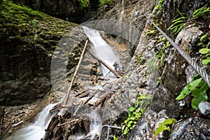 adventure hiking trail through canyon Kysel in Slovak Paradise National Park, Slovakia