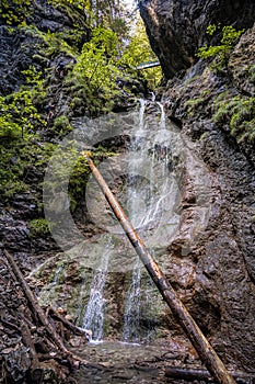 Adventure hiking trail through canyon in Slovak paradise national park, Slovakia.  Via ferrata in canyon Kysel. Discovery travel c