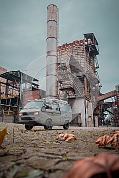 Adventure motorhome or vanlife dreams parked in the middle of Vitkovice former steel works or foundry
