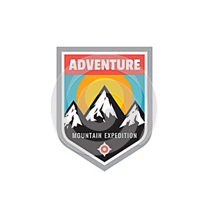 Adventure outdoors - concept badge. Mountain expedition climbing logo in flat style. Extreme exploration sticker symbol.  Camping