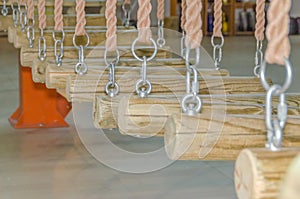 In the adventure Park logs on ropes closeup