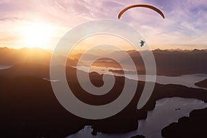 Adventure Sport Composite with Paraglider Flying over the ocean