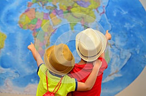 Adventure and travel concept. Happy kids are dreaming about travel, vacation.