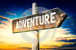 Adventure - wooden signpost, roadsign with one arrow