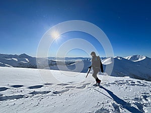 Adventurer conquering the frosty slopes of the Polish Tatras