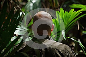 Adventurous Bald man jungle. Generate AI
