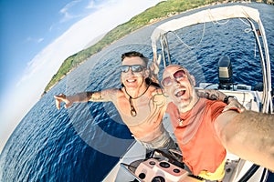 Adventurous best friends taking selfie at Giglio Island