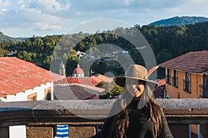 Adventurous girl, exploring the Magical Town of Tlalpujahua, Mexico. photo