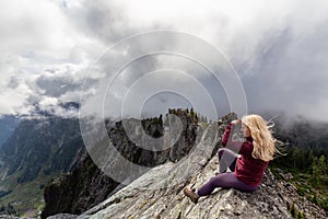 Adventurous Girl on top of Crown Mountain