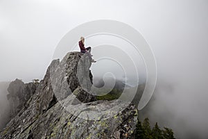 Adventurous Girl on top of Crown Mountain