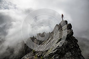 Adventurous Girl on top of Crown Mountain