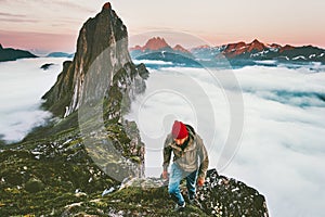 Adventurous man hiking in mountains outdoor active lifestyle