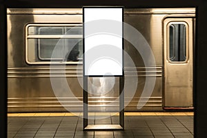 advertisement billboards electronic displays in a subway station in New York City.