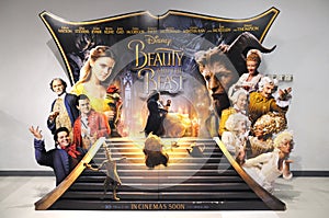 An advertisement display stand of the movie Beauty and the Beast