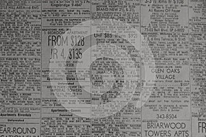 Advertisements for rental properties in old newspaper