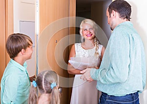 Advertising agent standing at doorway