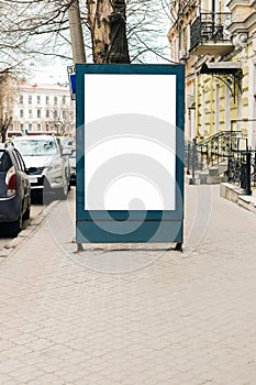 Advertising blank billboard on the sidewalk in the old city