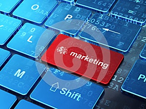 Advertising concept: Finance Symbol and Marketing on computer keyboard background