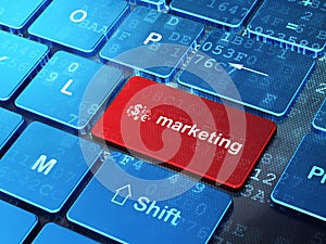 Advertising concept: Finance Symbol and Marketing on computer keyboard background photo