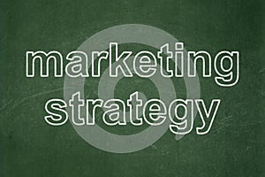 Advertising concept: Marketing Strategy on chalkboard background