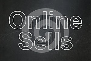 Advertising concept: Online Sells on chalkboard background