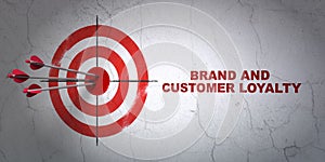 Advertising concept: target and Brand and Customer loyalty on wall background