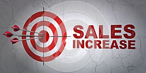 Advertising concept: target and Sales Increase on wall background