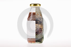 Advertising glass bottle product of blended natural cereal from fresh organic soybeans, red beans, white beans, mung beans, and