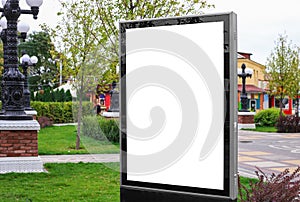 Advertising space under the poster. Lightposter citylight mockup small billboard in the city near the roadway. white space for