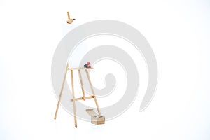 Advertising stand or flip chart or blank artist easel isolated on white