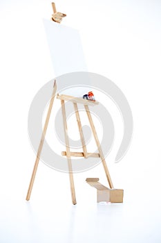 Advertising stand or flip chart or blank artist easel isolated on white