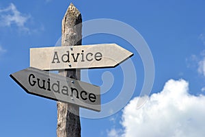 Advice and guidance - wooden signpost with two arrows